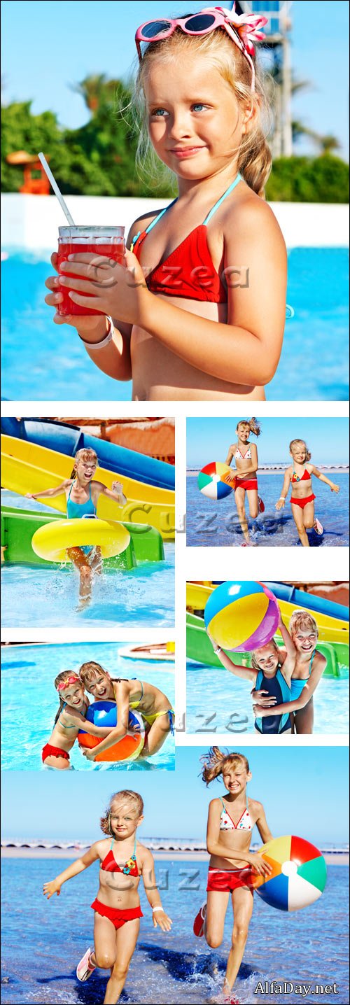 ���� � ��������� / Children on water slide at aquapark - stock photo