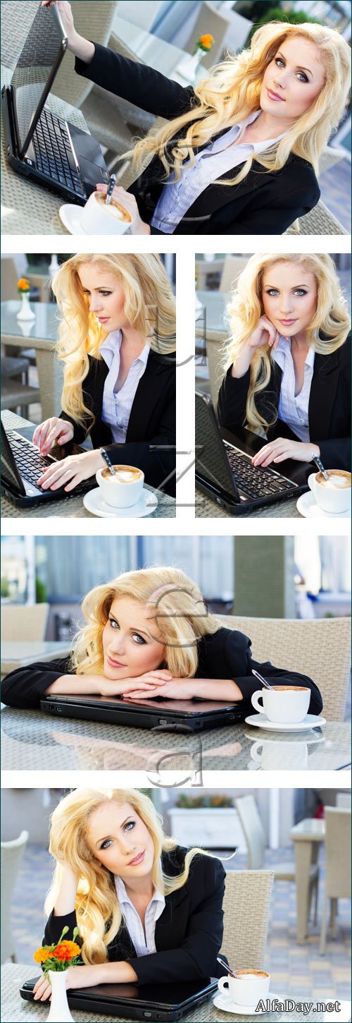 ���������� � ������ ���� � ��������� / Young pretty business woman with notebook - stock photo