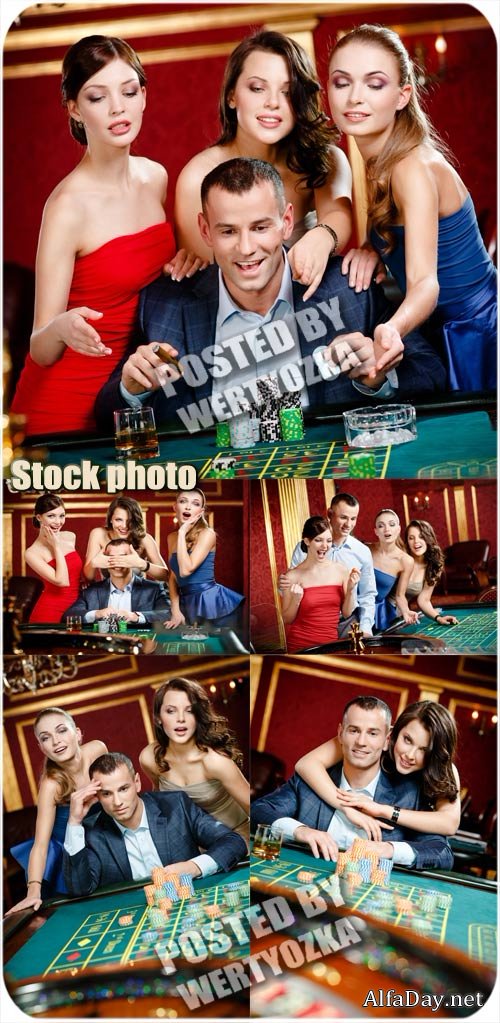������� � ��������� ������ � ������ / Man with the women playing at the casino - stock photos