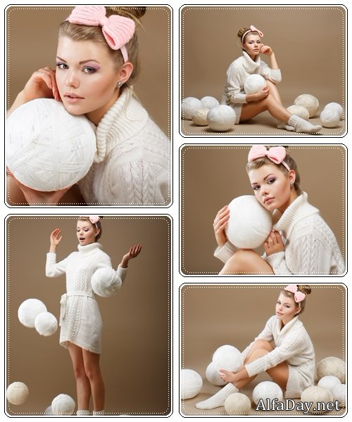 Needlewoman with White Skeins of Yarn - stock photo