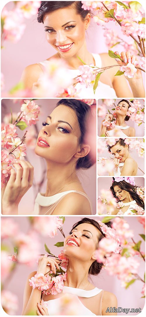 �������� ������� ������� � �������� �������� ���� / Beautiful young woman in spring blossoming garden