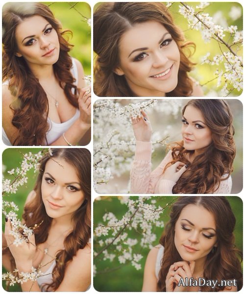 Portrait of a young brunette in the spring garden - stock photo