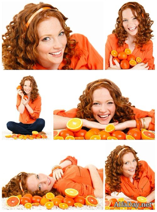 ����������� ������� ������� � ����������� / Red-haired young woman with citrus - Stock photo