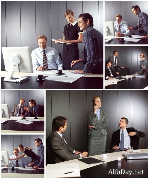 Businesspeople at computer - Stock Photo