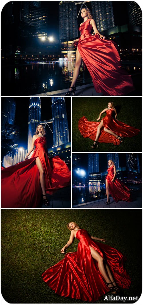 ������� � ������� ������ �� ���� ������� ������ / Girl in a red dress on a night city - Stock Photo