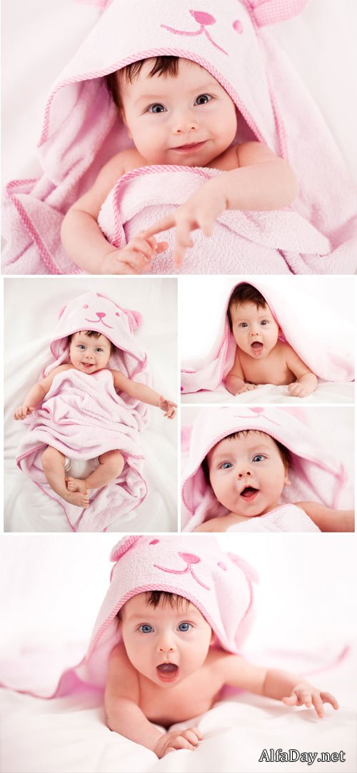 �������������� ������� � ������� ��������� / Charming baby in a pink bedspread - stock photos