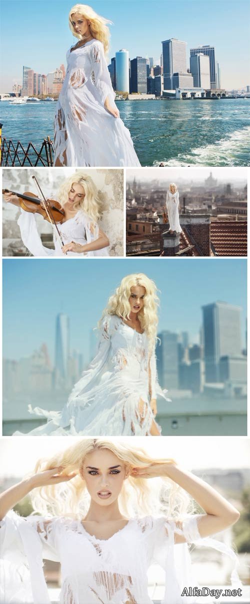Girl in a white dress on background of the city - Stock Photo