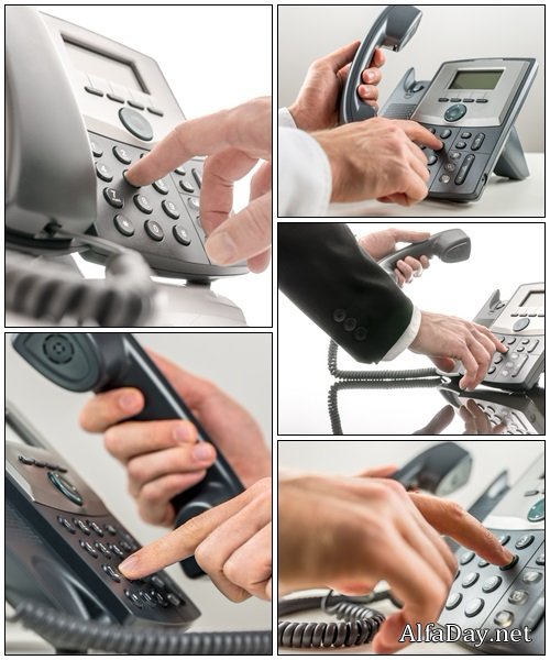 Operator dialing a phone number - Stock Photo
