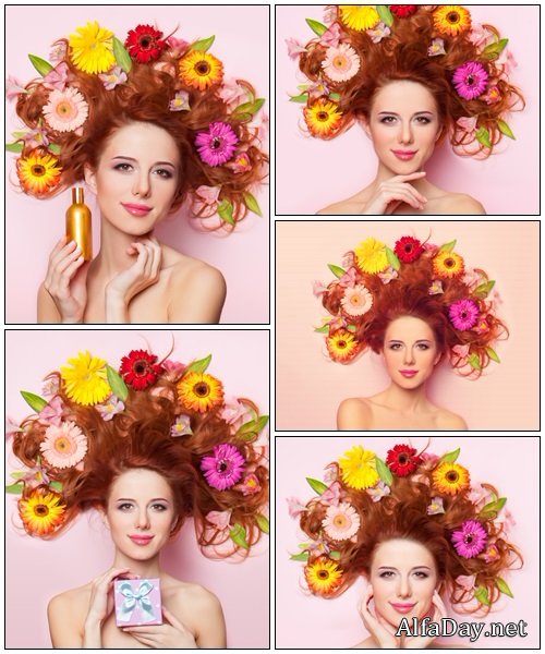 Beautiful redhead girl with flowers on pink background - Stock Photo