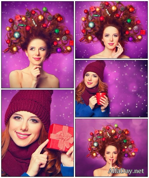 Beautiful redhead girl with christmas toy - Stock Photo