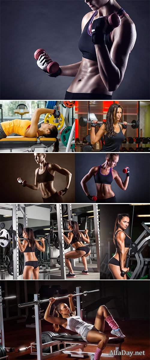 Stock Photo Fitness young woman with dumbbells on a dark background