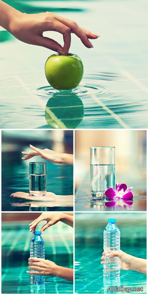 Water bottle and a glass of water - Stock Photo
