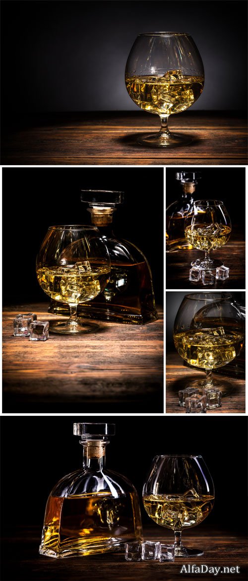 Bottle and glass of whiskey, alcoholic beverages - stock photos