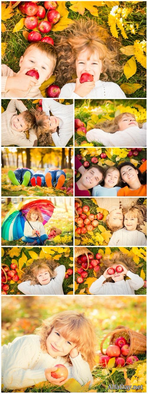 Happy family having fun outdoors in autumn park