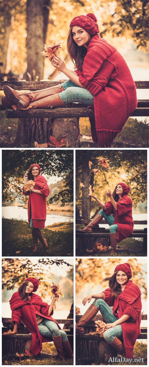 Beautiful woman wearing knitted coat in autumn park - Stock photo