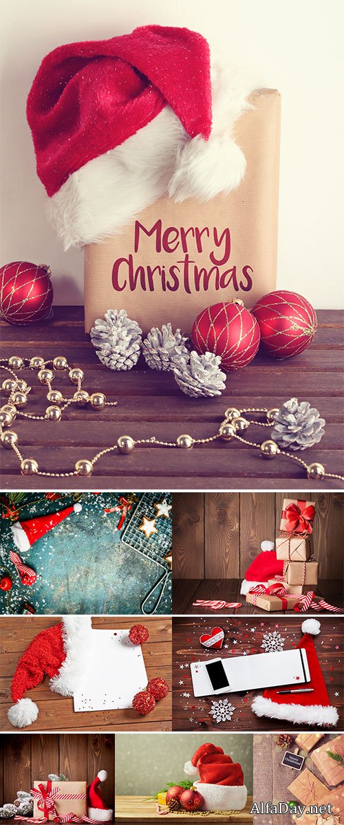 Stock Image Santa Hat with Christmas decorations on wooden table