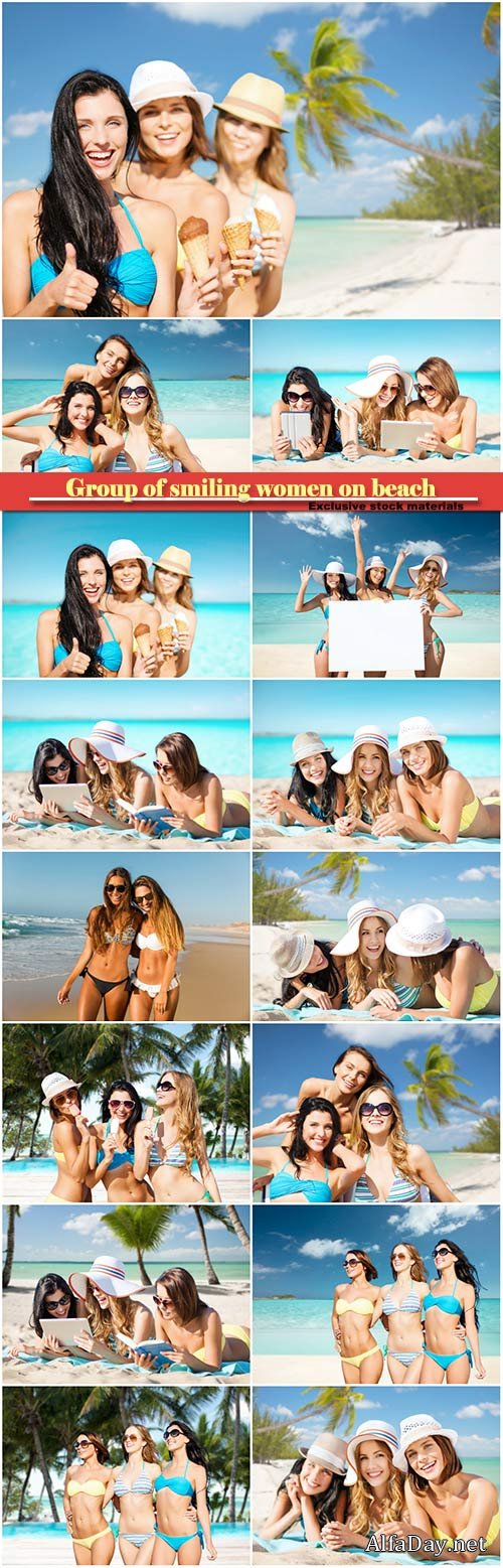 Group of smiling women eating ice cream on beach