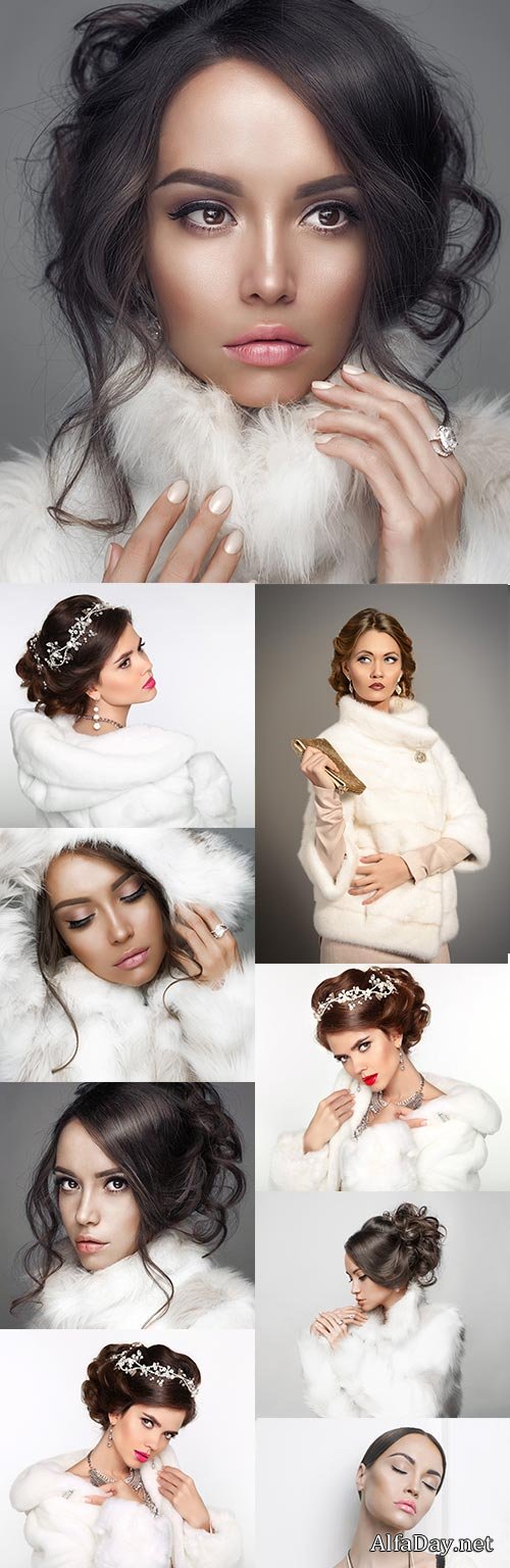 Christmas beautiful girl in white fur clothes with a hood