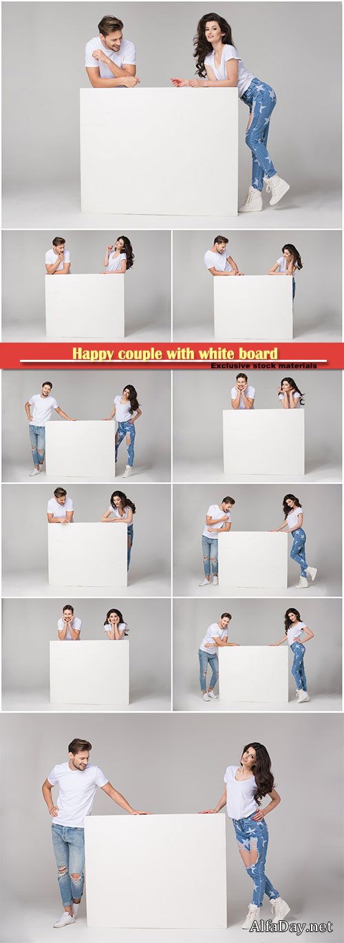 Happy couple with white board