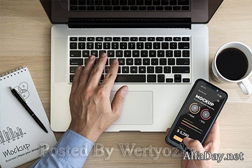 Top view man using laptop and phone mock-up